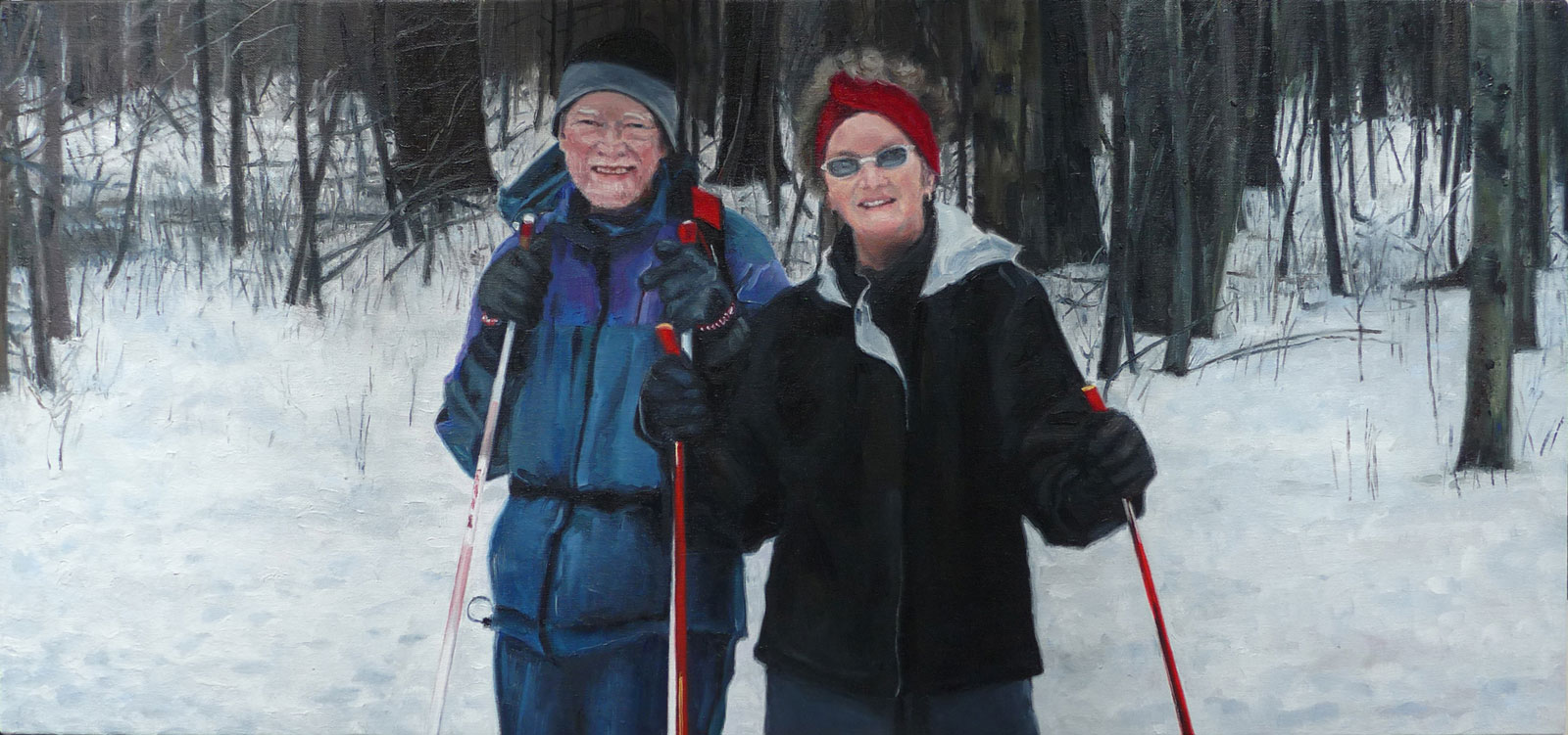 Portrait of couple with cross country skis.